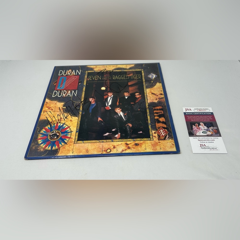 Duran Duran signed Seven and‎ the Ragged Tiger Album JSA COA